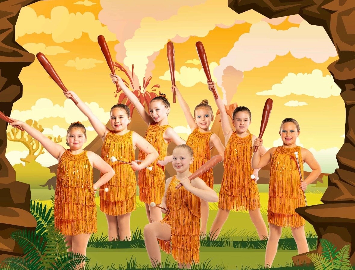 Children in dance class performing
